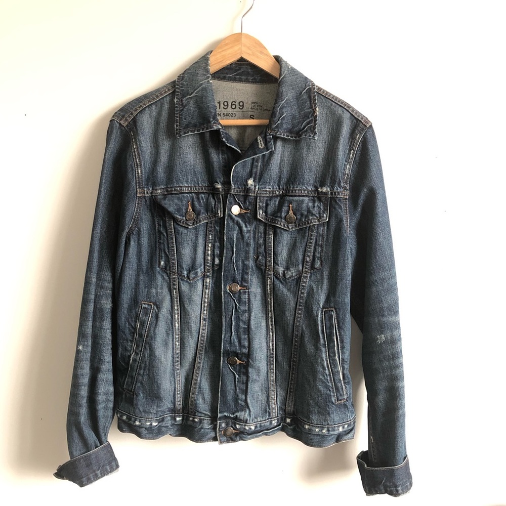 Distressed denim jacket.